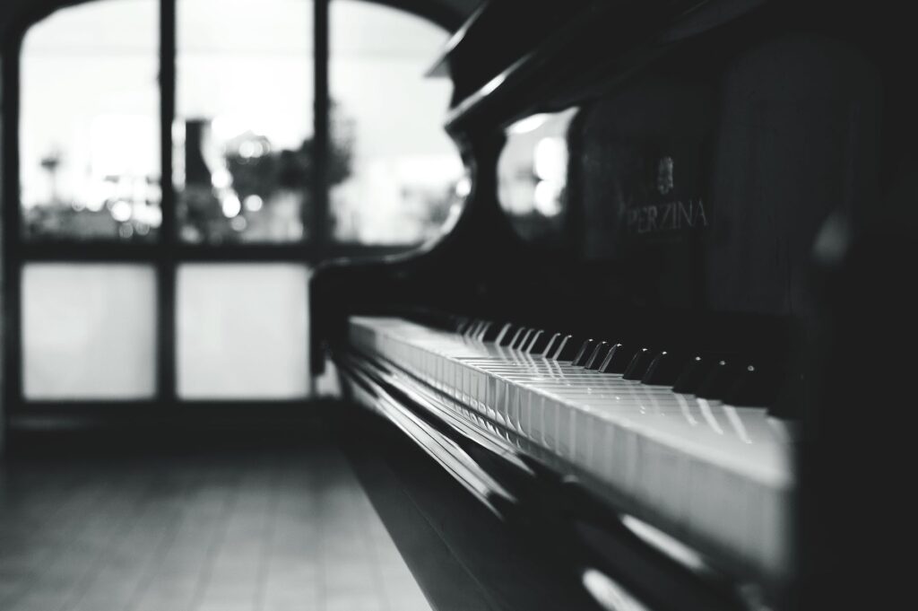 The Three Types of Grand Pianos black grand piano gray scale photo