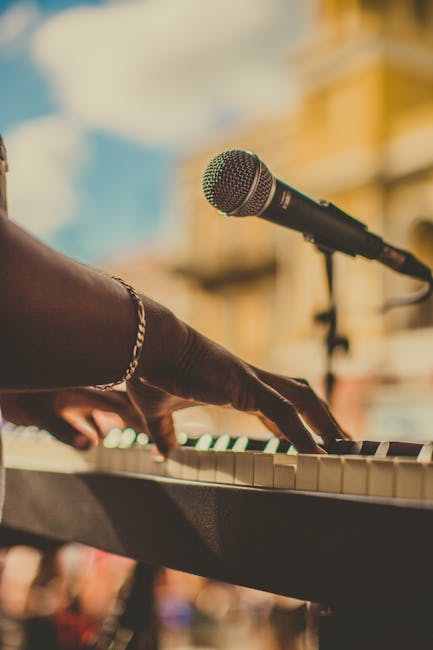 pexels photo 2927080 2927080 Musician playing piano and singing with a microphone outdoors in San Juan.
